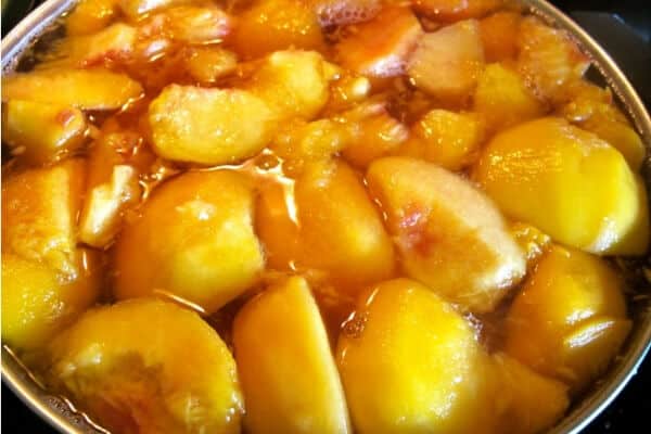 canning peaches- cooking peaches