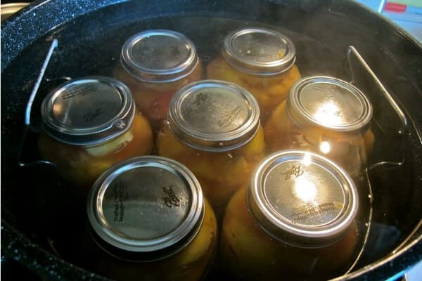 canning peaches- in canning pot