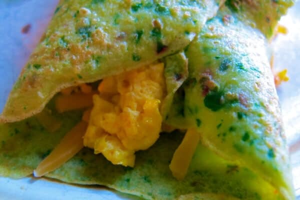 egg burrito in a swiss chard crepefor homemade frugal meal
