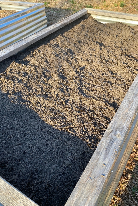 raised bed filled with soil and compost