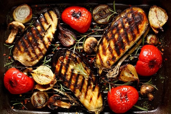 grilled eggplant steaks with tomatoes, onions and mushrooms