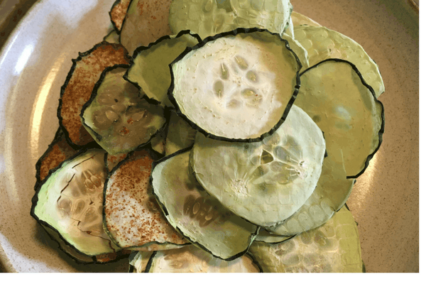 Preserve cucumbers by making dehydrated cucumber chips- a great way to preserve your summer harvest!