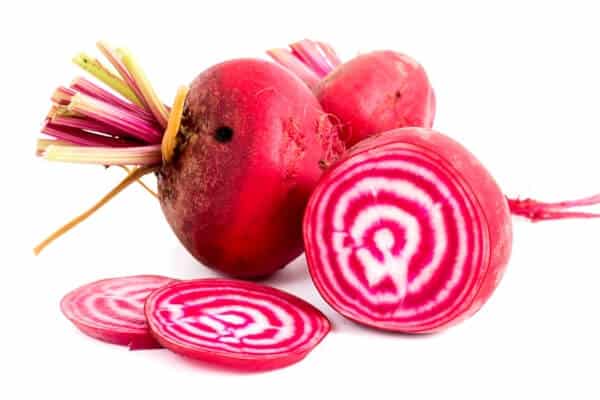 pink and white striped beets cut open