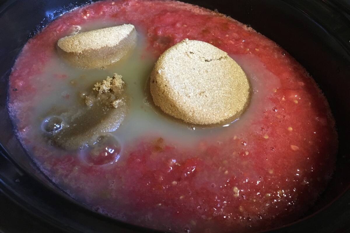 tomatoes and sugar in crock pot for jam