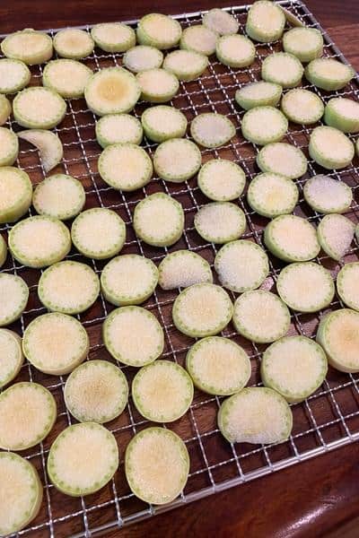 zucchini slices on a dehydrator tray